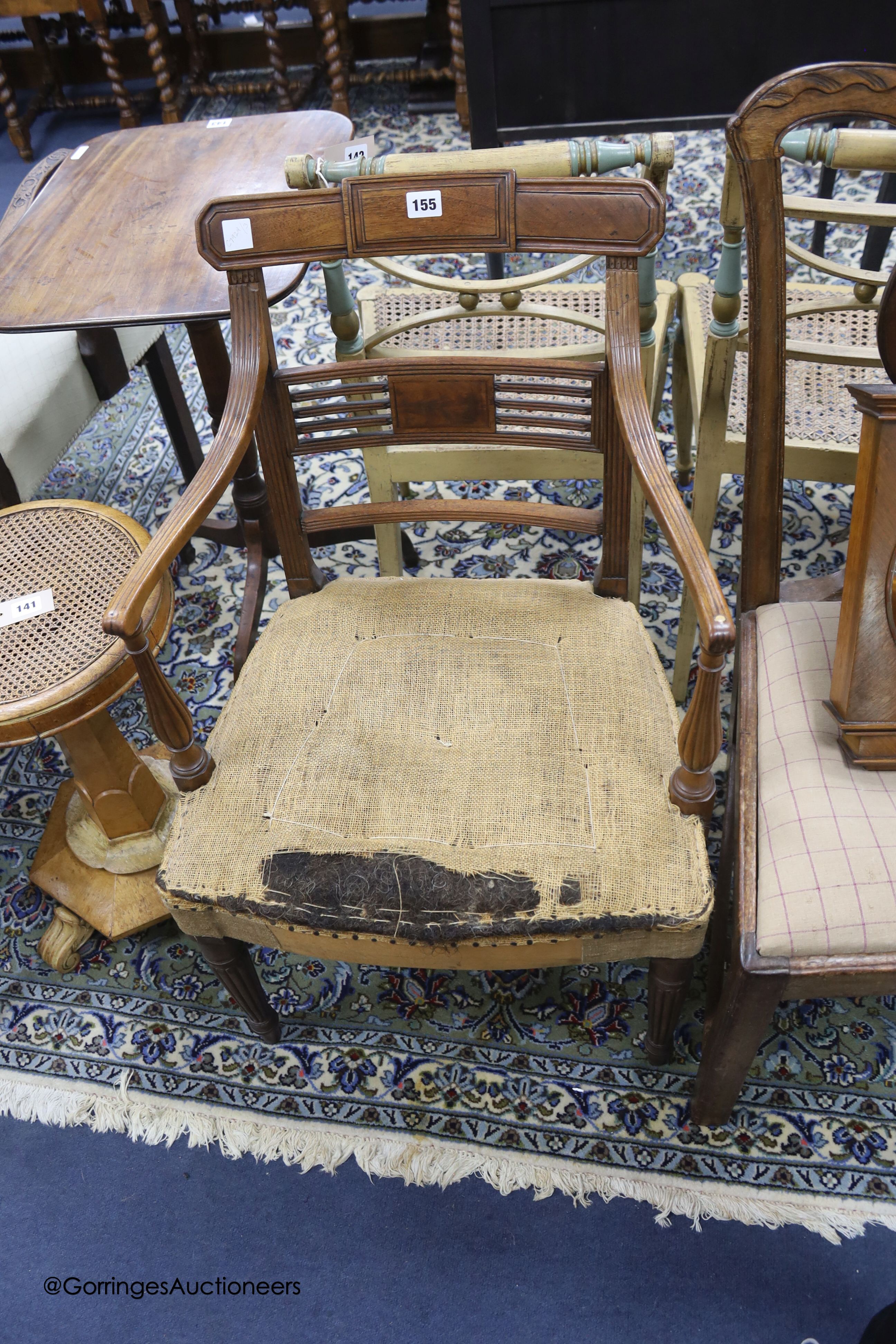 A Sheraton period mahogany elbow chair
